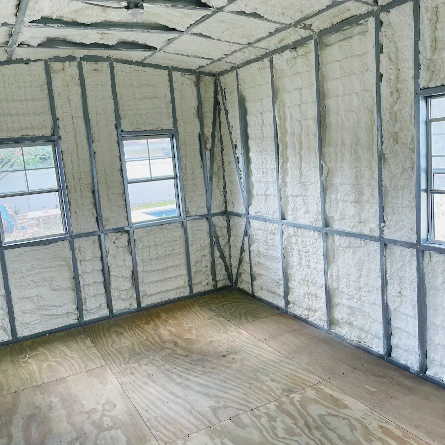 Closed-cell spray foam insulation applied to wall cavities in a residential project in Payson